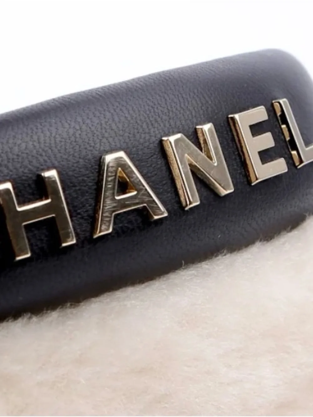 CHANEL Cream Shearling Ankle Boots with Black Leather Trim